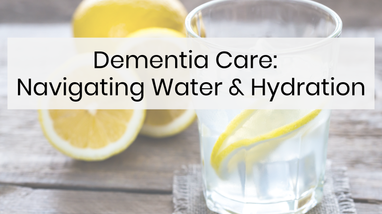 glass of water with slice of lemon in it sitting on table beside a cut lemon