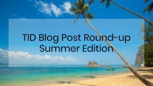 Sandy beach in foreground with ocean view with title TID Blog Post Round-up Summer Edition